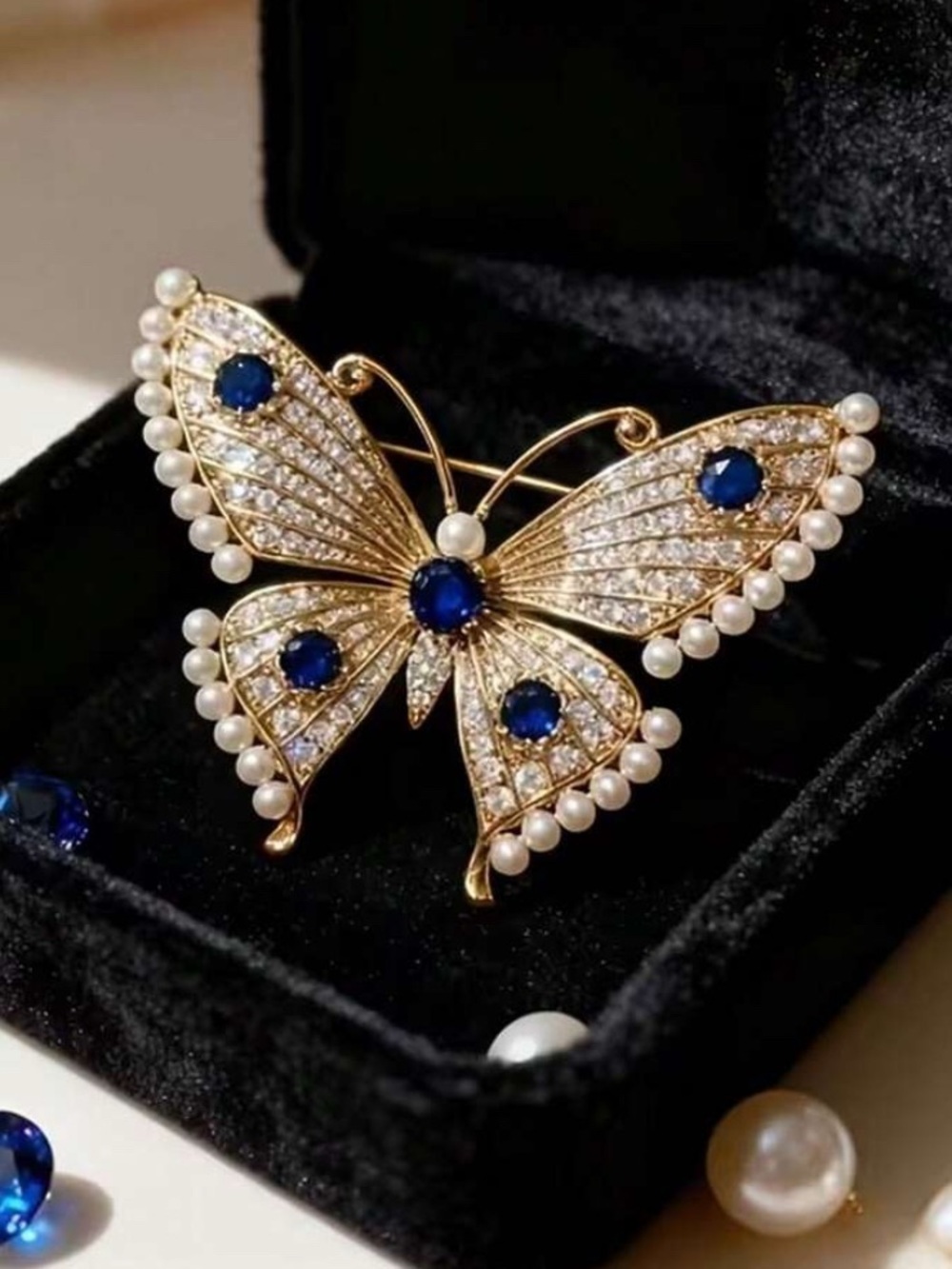 Gold-Tone Butterfly Brooch with Blue Crystals and Pearls